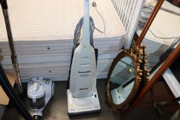 A Panasonic Super Lightweight upright vacuum clean