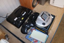 A SEGA Mega-Drive together with a quantity of vari