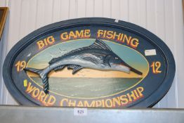 A wooden plaque depicting big game fishing