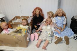 A collection of various dolls to include two Himst