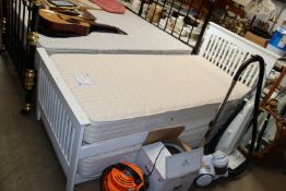 A modern single trundle bed together with Relyon D