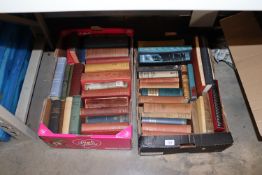 Two boxes containing various books to include Foli