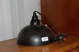 A Jim Lawrence Butler black pendant light fitting with shade, approx. 23cms in diameter