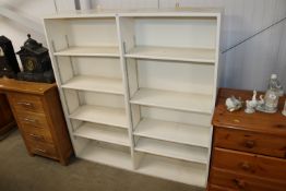 A white painted shelving unit