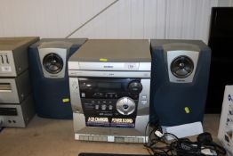 A Samsung mini component system together with a pa