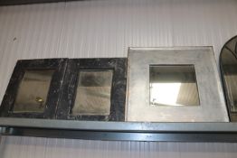Three modern framed wall mirrors