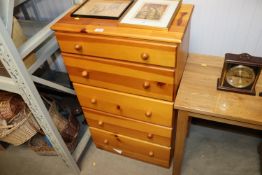 A modern pine chest fitted five drawers