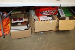 Three boxes containing various magazines and books