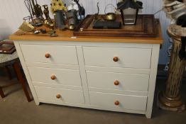 A modern pine chest fitted six drawers