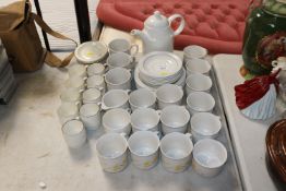 A collection of various Poole tea ware together wi