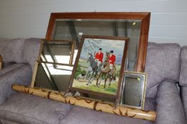 A large pine framed and bevel edged wall mirror to