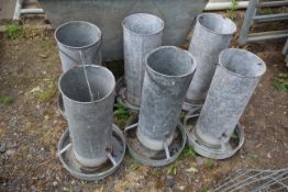 6x chicken feeders.