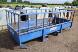 Watson 12x5 skid mounted solid floor big bale feeder. With pallet tine slots. 2020. For sale due