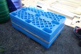 Quantity of plastic stacking pallets.