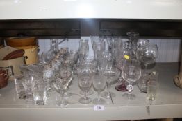 A collection of various table glassware including