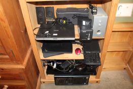 A Toshiba laptop, Sony speakers, a Canon tablet, k