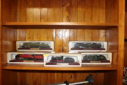 Seven model trains including 'Duchess LMS', 'LNER Flying Scotsman' etc