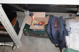 A cased picnic set, another picnic set and a child