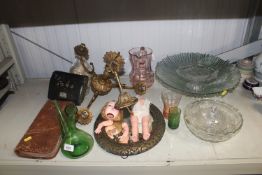 A collection of various glassware including a larg