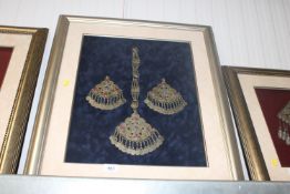 A framed and glazed study of Eastern White Metal wedding jewellery