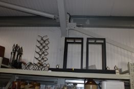 Two extending fire kerbs, two fireside log baskets