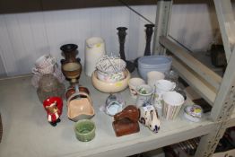 A pair of wooden candle sticks, various Studio pot