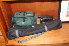 A Sony camcorder and case and a camera tripod