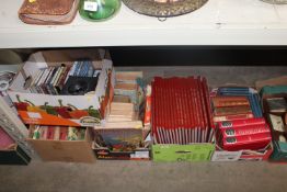 Five boxes containing various books and cassettes