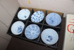 A boxed collection of six Japanese blue and white