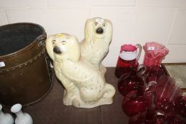 A pair of Victorian Staffordshire spaniel ornament