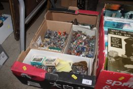 A box containing various metal war gaming soldiers