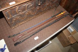 Four various riding crops