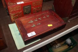 A Mah Jong set contained in decorated soft wood travelling case and a set of standard rules, unknown