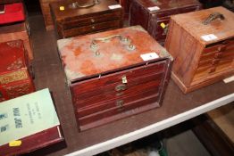 A Mah Jong set contained in metal mounted five dra