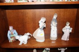Four Lladro ornaments to include a polar bear, a f