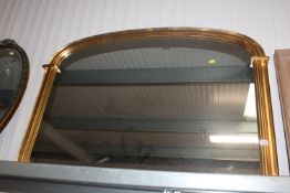 A gilt framed overmantel mirror