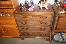 A Victorian mahogany chest fitted four long drawer