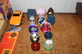 A collection of various glass paperweights to incl