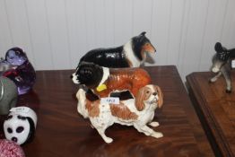 A Royal Doulton ornament of a dog together with a
