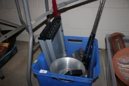 A box containing a Champagne bucket and various me