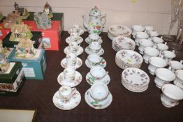A Herend coffee pot and five cups and saucers; and