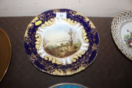 An early 19th Century plate, painted with a view o