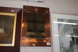 A Liberty & Co. Arts & Crafts design copper mirror