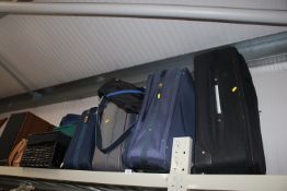 A collection of various suitcases and storage bags