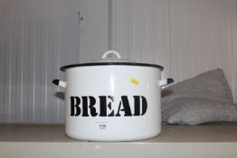 An enamel bread bin