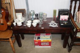 A hardwood hall stand fitted two drawers