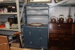 A blue painted dresser