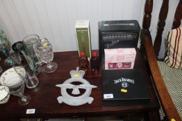 A collection of various alcohol to include Pink Gi