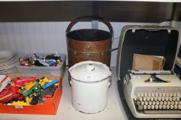 A copper and brass banded bucket having swing hand