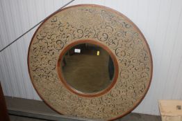A modern circular framed and bevelled edge wall mi